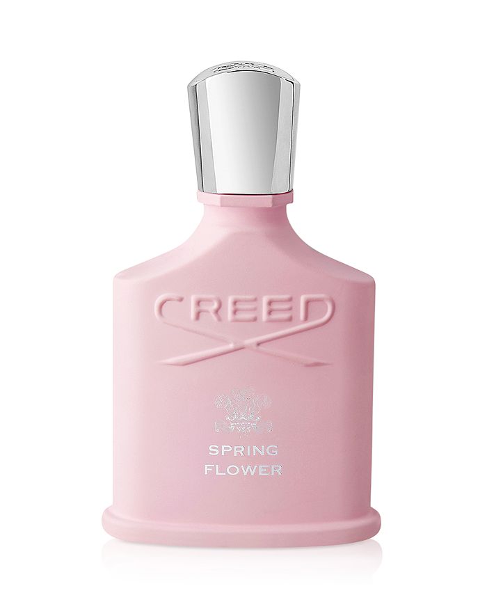 Creed Spring Flower Eau De Parfum Spray 2.5 oz by Paris Connection Perfumes features an elegant and feminine bottle with a delicate design, housed in a luxurious pink and gold box that perfectly reflects the fragrance's floral essence.