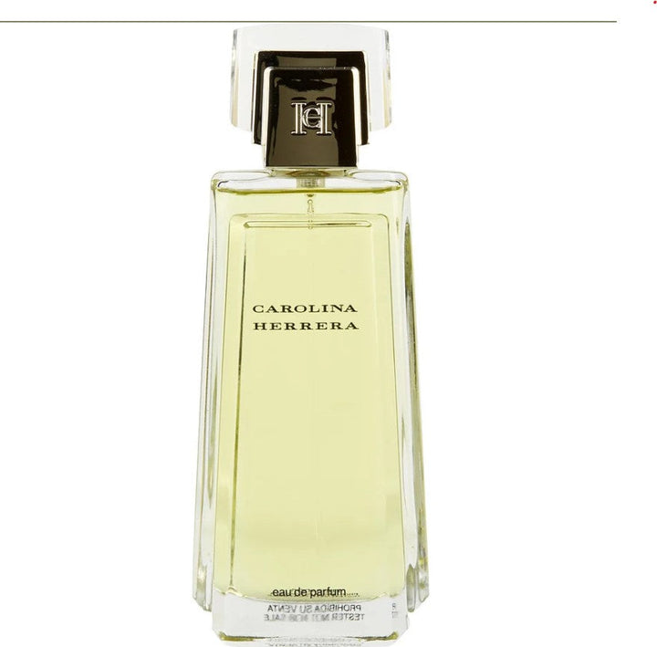 CAROLINA HERRERA 3.4 OZ EDP WO embodies timeless elegance in a fragrance.