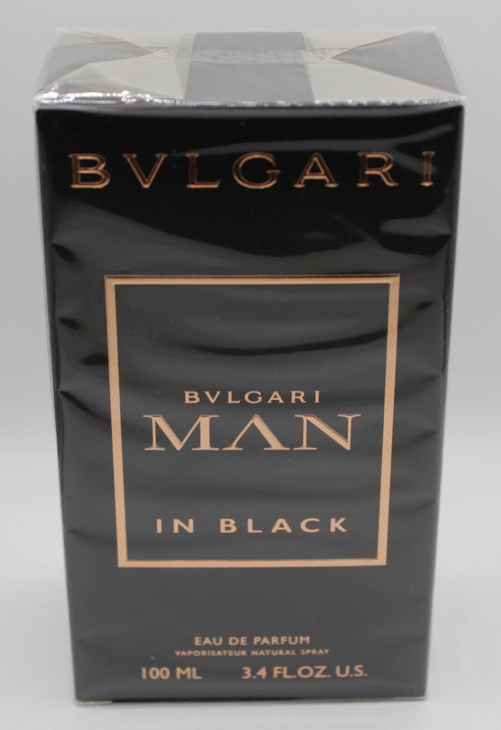 "BVLGARI MAN IN BLACK 3.4 OZ EDP fragrance bottle featuring an elegant design, showcasing its luxurious black and gold packaging.