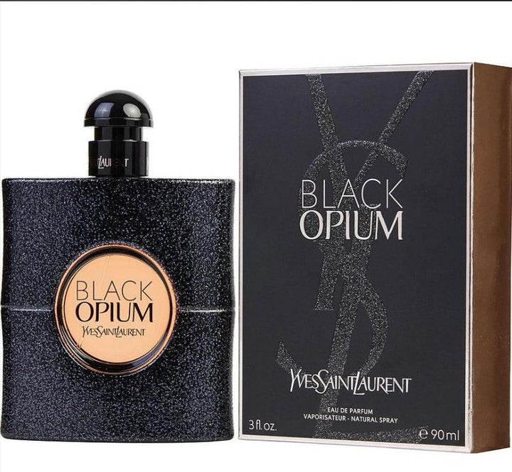 Black Opium 3 oz EDP bottle featuring a sleek, modern design with a sparkling black exterior and a shimmering gold cap, set against an elegant backdrop. Available at Paris Connection Perfumes.