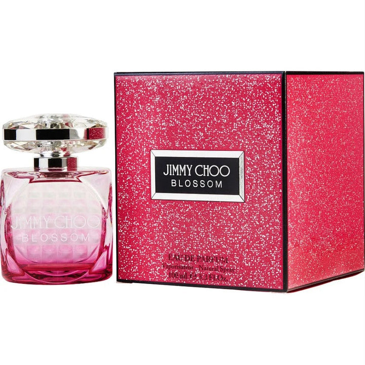 Jimmy Choo Elegant bottle of BLOSSOM 3.3 OZ EDP for women by Paris Connection Perfumes, featuring a floral fragrance in a sleek design.