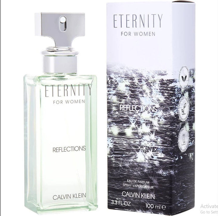 Eternity Reflections 3.4 oz EDP, embodying serenity and floral elegance , 3.4 oz Eau De Parfum at ParisConnectionPerfumes.com – Exquisite bottle design that embodies modern sophistication, ideal for the woman who seeks a touch of luxury in her everyday scent.