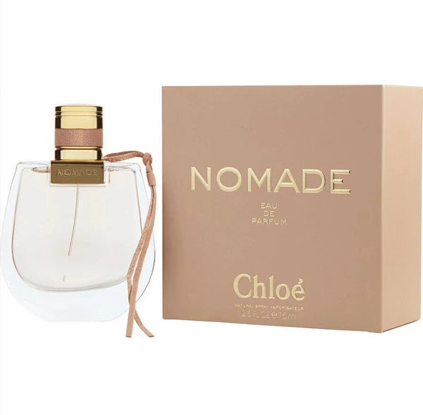 "Chloe Nomade 2.5 oz EDP for women, elegantly designed bottle featuring a light amber hue, showcasing its floral and fruity fragrance notes, available at Paris Connection Perfumes."