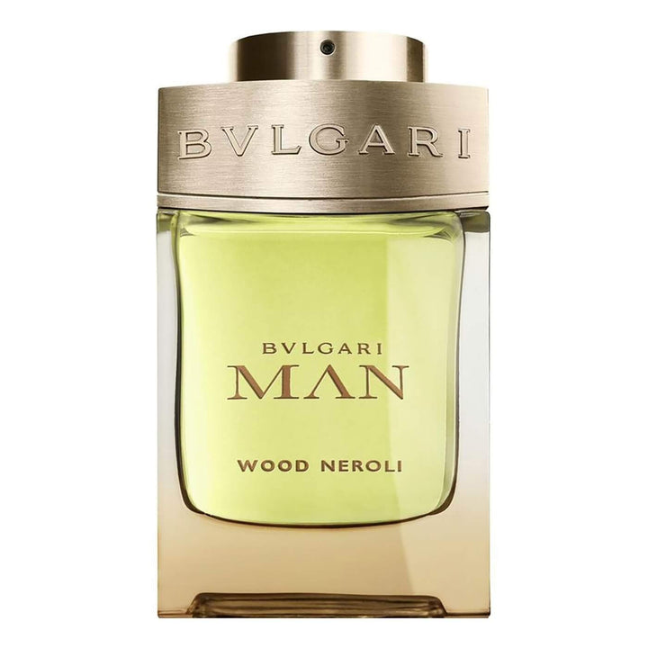 BVLGARI WOOD NEROLI 3.4 oz EDP bottle featuring a sleek design with warm, earthy tones, surrounded by a luxurious Paris Connection Perfumes box. The box showcases elegant Parisian motifs, exuding a sense of sophistication and allure, perfect for gifting or personal indulgence.