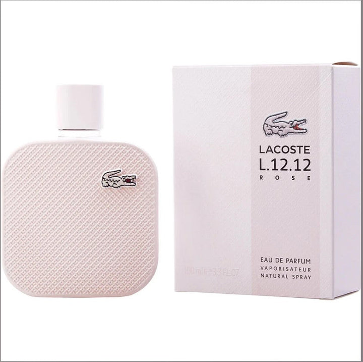 LACOSTE ROSE 3.3OZ EDP bottle featuring a sleek, feminine design with a pink hue, elegantly displayed against a soft background, symbolizing freshness and floral notes.