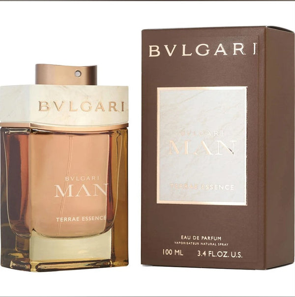 "BVLGARI TERRA ESSENSE 3.4 EDP bottle displayed elegantly, showcasing its unique design and rich amber color, available at Paris Connection Perfumes."