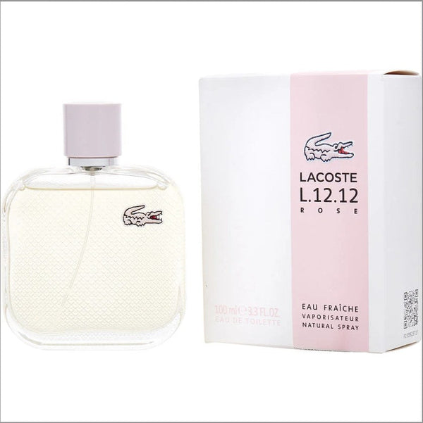 LACOSTE ROSE EAU FRAICHE 3.3 OZ bottle featuring a sleek design with a pink hue, representing a fresh and fruity fragrance perfect for women, displayed elegantly against a soft background.