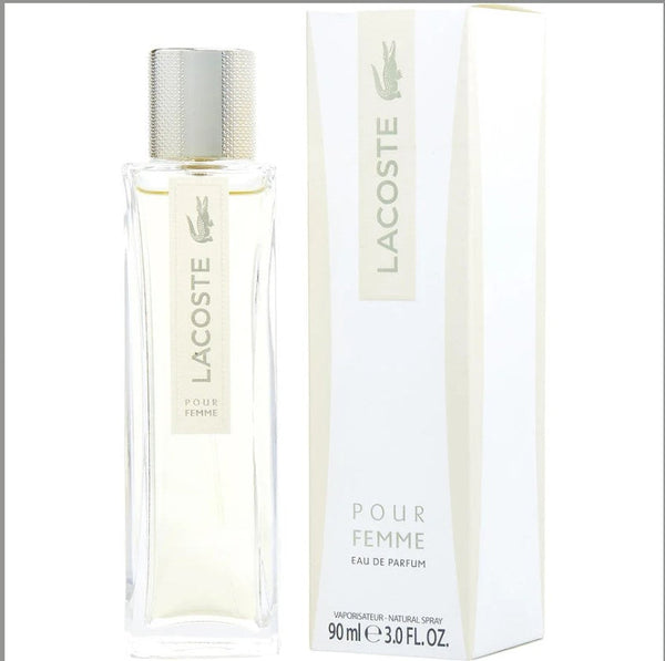 LACOSTE POUR FEMME 3.0 OZ EDP displayed elegantly in a sleek bottle, showcasing its feminine design and signature branding, available at Paris Connection Perfumes.