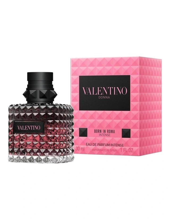 A 3.4 oz bottle of Valentino Donna Born In Roma Intense EDP Spray for Women by Paris Connection Perfumes, featuring a luxurious black studded design, offering a bold and sensual fragrance for a powerful statement.