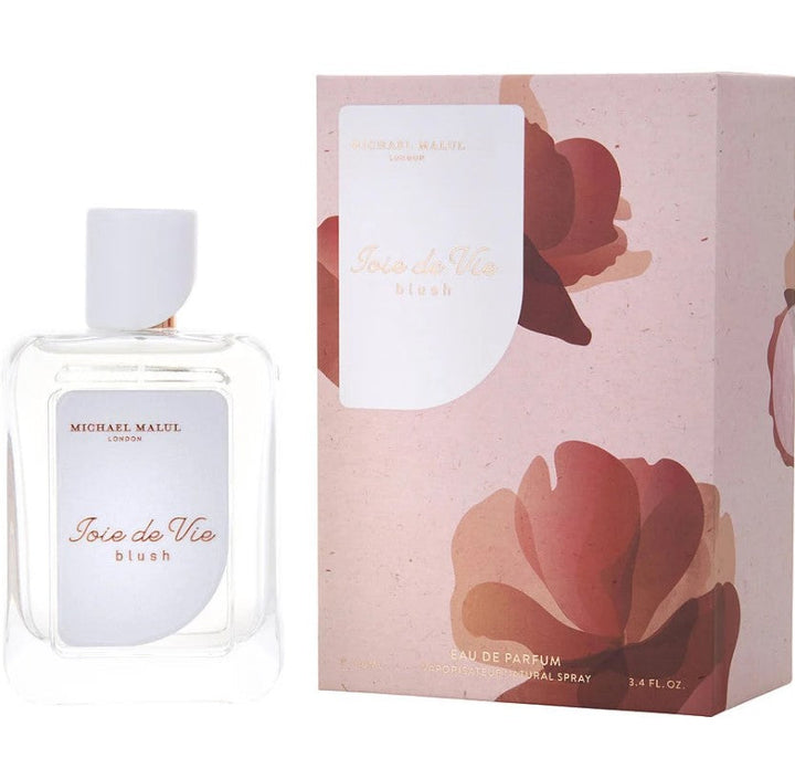 Joie de Vie Blush 3.4 oz Eau de Parfum, elegantly packaged in a feminine bottle adorned with soft pink hues, available at Paris Connection Perfumes.