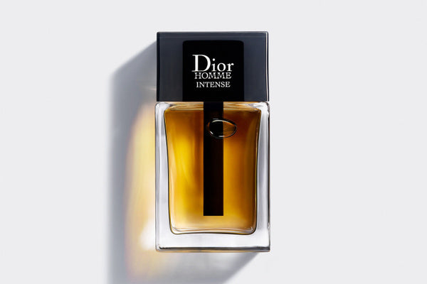 Elegant DIOR HOMME INTENSE 3.4 OZ EDP displayed at Paris Connection Perfumes, featuring a sleek, modern bottle with a matte black finish and refined lines, complemented by luxurious packaging that exudes sophistication.