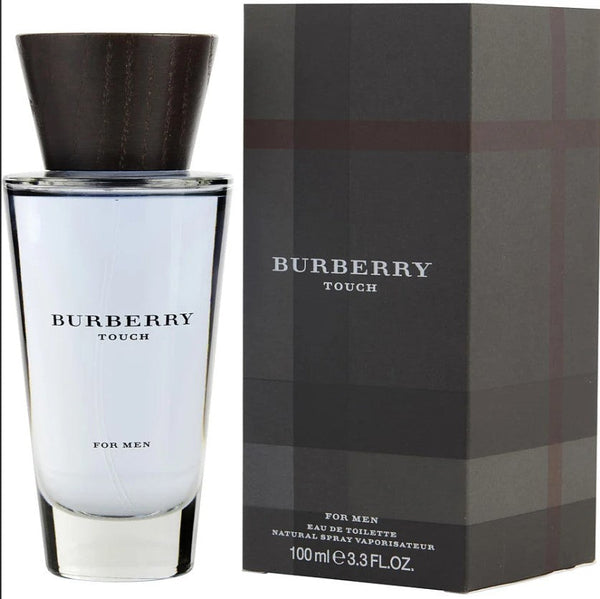 BURBERRY TOUCH 3.3 OZ EDT elegantly displayed with a classic backdrop. Available at Paris Connection Perfumes.