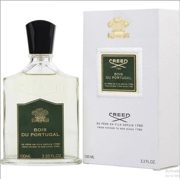 Creed Bois du Portugal 3.3 oz bottle. Elegant scent featuring warm woods and aromatic notes. Available at Paris Connection Perfumes