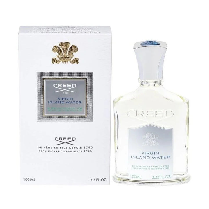 Creed Virgin Island Water fragrance displayed on a marble countertop, showcasing its elegant packaging. Available at Paris Connection Perfumes.