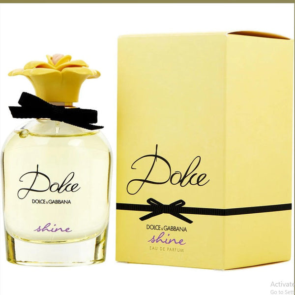 Dolce Shine 2.5 oz EDP for Women with bright tropical notes and floral elegance. Available at Paris Connection Perfumes