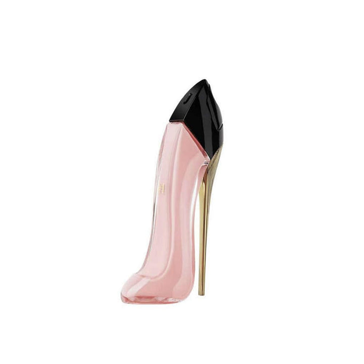 Good Girl Blush 1.7 oz EDP presented at Paris Connection Perfumes, featuring an elegant stiletto-shaped bottle in a soft pink tone, symbolizing a vibrant and playful fragrance that captures the essence of modern femininity.

