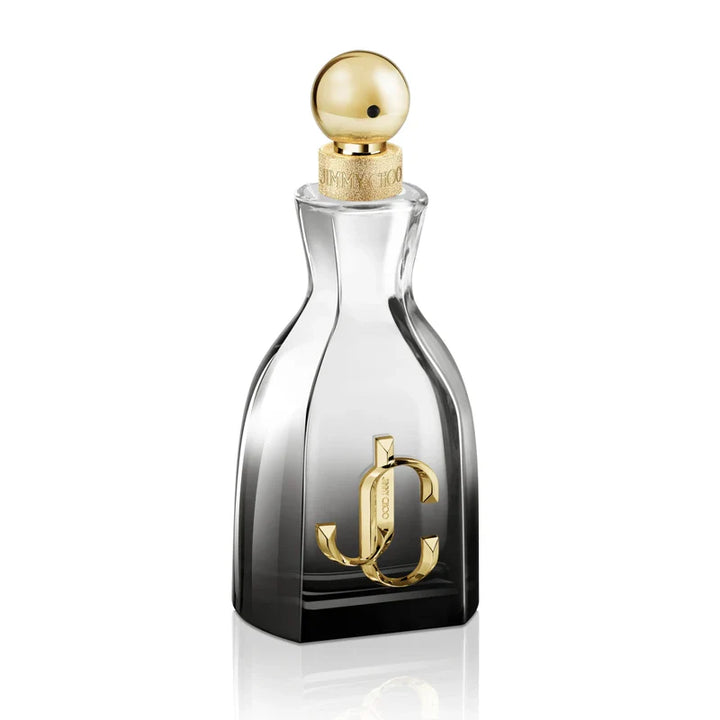 I WANT CHOO FOREVER 3.3 OZ EDP from Paris Connection Perfumes features an elegant, heart-shaped bottle adorned with a luxurious golden cap, elegantly packaged in a chic, pastel pink box that reflects the fragrance's romantic essence.