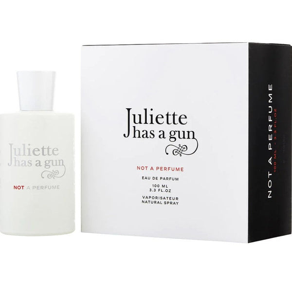 Juliette Has A Gun 3.3 oz EDP bottle showcasing its elegant and modern design, symbolizing a bold and unique fragrance experience, available at Paris Connection Perfumes.