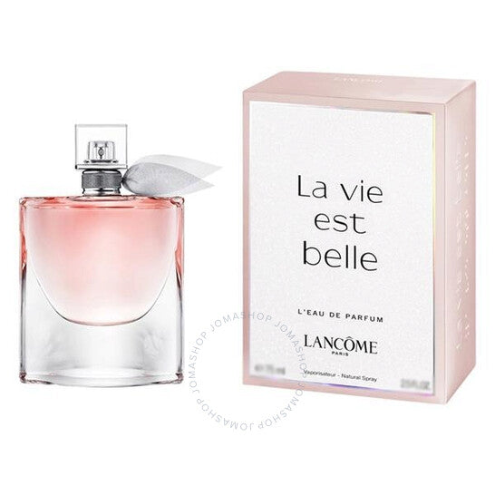 LA VIE EST BELLE opens with a sparkling combination of pear and blackcurrant, offering a fresh and fruity introduction. Available at Paris Connection Perfumes.