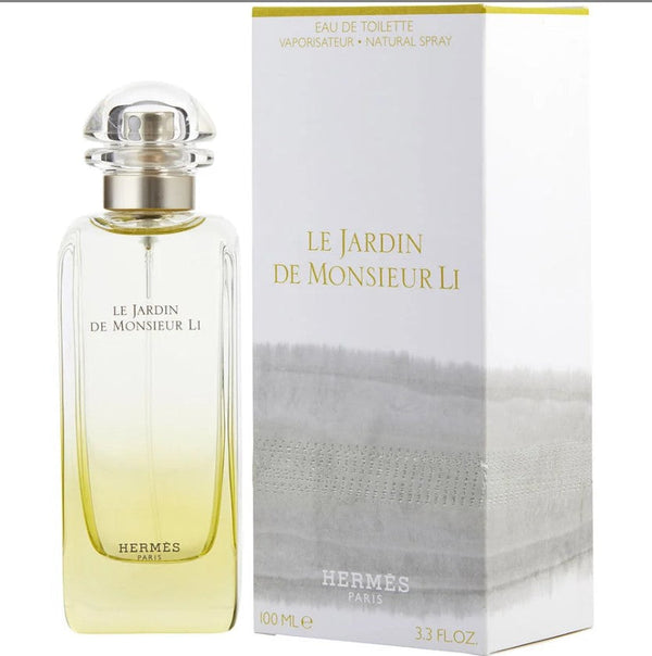 LE JARDIN DE MONSIERUR LI 3.3 at Paris Connection Perfumes: A beautifully designed perfume bottle featuring an elegant shape with a delicate floral motif, showcasing the essence of a lush garden. The bottle is set against a soft, inviting background, emphasizing its luxurious fragrance and sophisticated appeal.