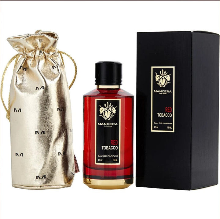 MANCERA RED TOBACCO 4.0 OZ EDP bottle featuring a sleek design with a deep red hue and gold accents, set against a simple background to highlight its luxurious appeal. The fragrance is known for its rich tobacco and spicy notes, making it a bold choice for confident individuals.