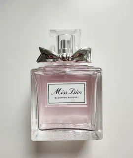 Experience the enchanting allure of Miss Dior Blooming Bouquet Eau De Toilette Spray 3.4 oz at Paris Connection Perfumes. This delightful fragrance opens with fresh notes of peony and rose.