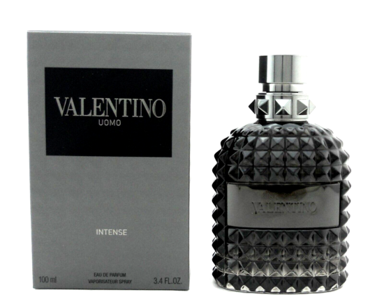 Valentino Uomo Intense Eau De Parfum Spray 3.4 oz from Paris Connection Perfumes, featuring an elegant dark glass bottle with a luxurious textured cap, beautifully presented in a sophisticated black box that exudes modern masculinity.