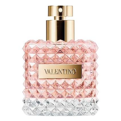 A close-up of Valentino Donna Eau De Parfum Spray 3.4 oz, showcasing its luxurious packaging and captivating floral scent, featured at Paris Connection Perfumes.