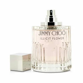 Discover the allure of ILLICIT FLOWER JC 3.3 OZ EDT from Paris Connection Perfumes, presented in a stunning glass bottle that reflects femininity, accompanied by luxurious packaging that enhances its enchanting floral essence.