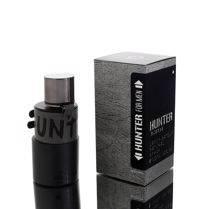 Elegant HUNTER INTENSE 3.4 OZ EDT by Paris Connection Perfumes, showcasing a uniquely designed bottle with a rugged, masculine silhouette, beautifully presented in an eye-catching box that emphasizes its intense fragrance.