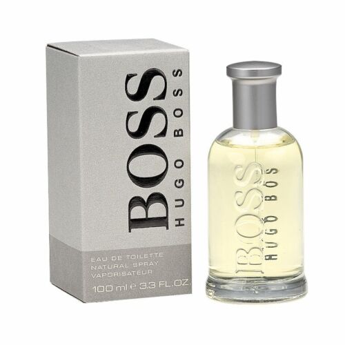 HUGO BOSS BOTTLED EDP 3.3 OZ available at Paris Connection Perfumes, featuring a striking bottle design that combines elegance and simplicity. The distinctive glass bottle, adorned with a luxurious silver cap, is beautifully packaged in a refined box, making it a perfect gift for fragrance lovers.